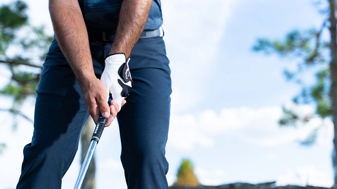 golfer lining up a shot